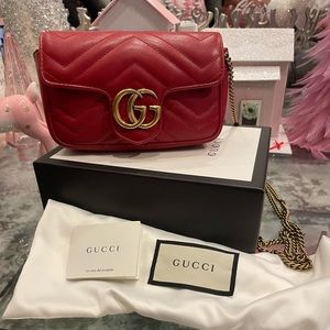 Gently used, mint condition red leather mini Gucci handbag